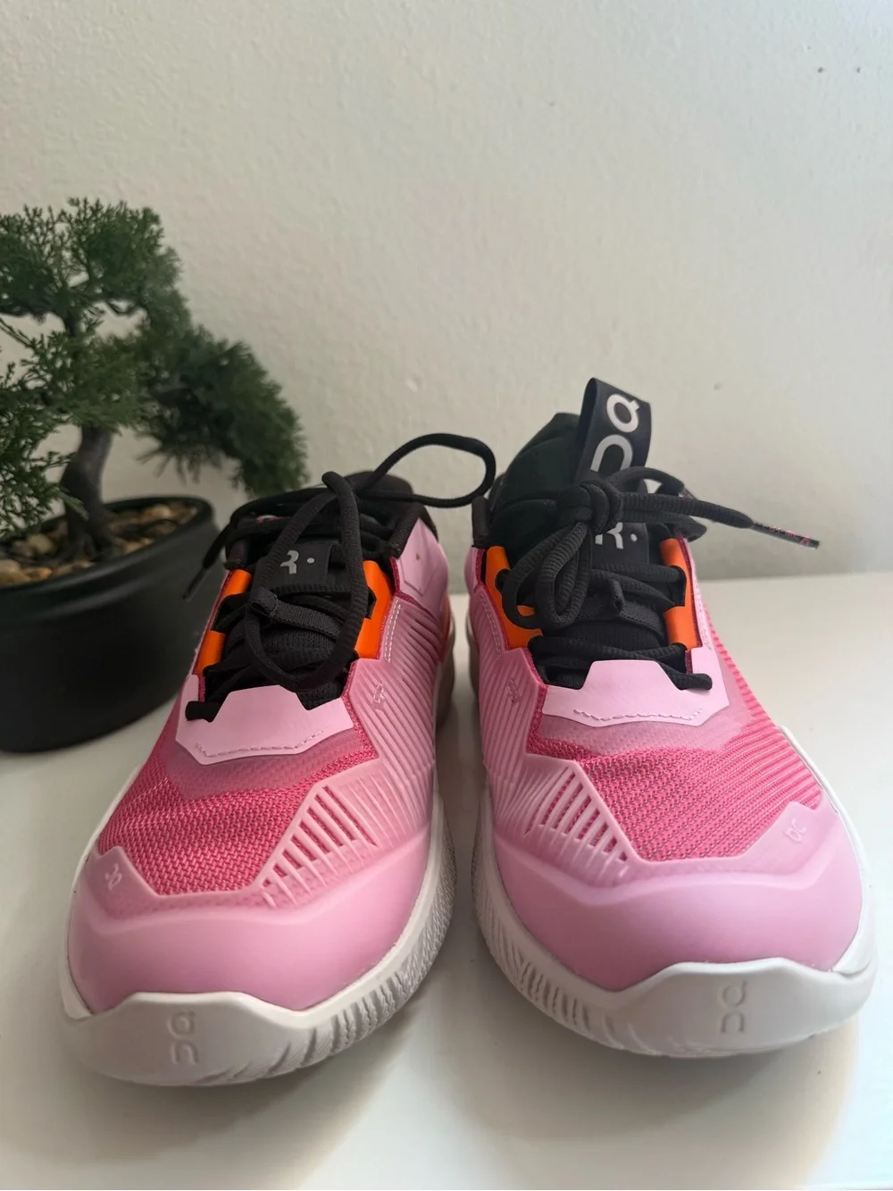 On the Roger pro fire men size 9  or women size 10 pink and Orange Men's Athleti